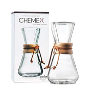 Chemex Classic Series 3-cup pour-over coffeemaker with iconic polished wood collar and leather tie. Image with Packing Box